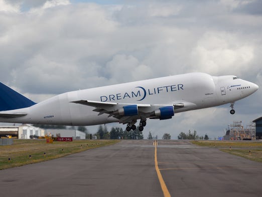 A Boeing Dreamlifter takes off from Paine Field in
