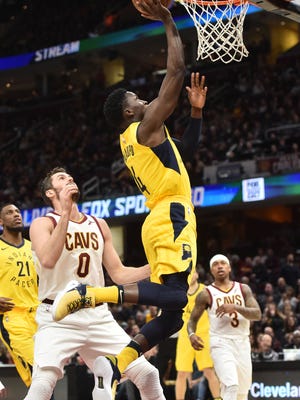 Jan 26, 2018; Cleveland, OH, USA; Indiana Pacers guard Victor Oladipo (4) moves to the basket against Cleveland Cavaliers forward Kevin Love (0) during the first half at Quicken Loans Arena. Mandatory Credit: Ken Blaze-USA TODAY Sports
