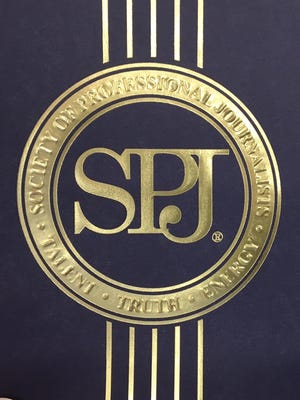 The Society of Professional Journalists logo.