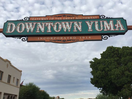 A marquee sign greets visitors on Main Street in Yuma’s