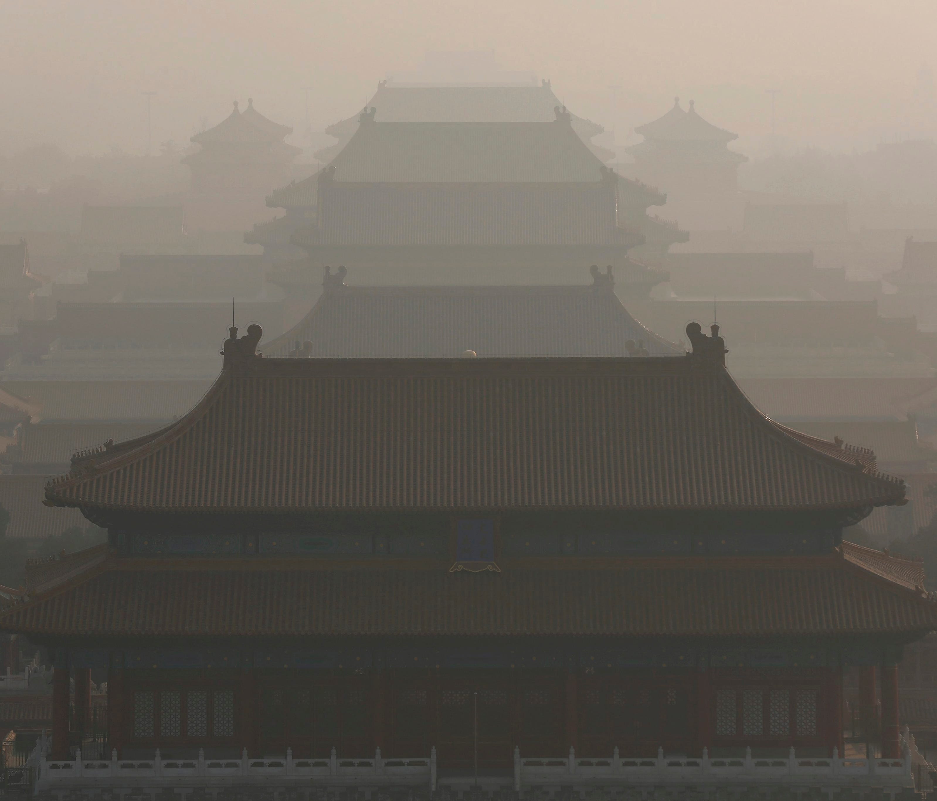 Haze envelops the Forbidden City in Beijing, China, on Dec. 19, 2016.