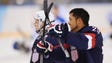 Rico Roman, right, was one of the U.S. sled hockey