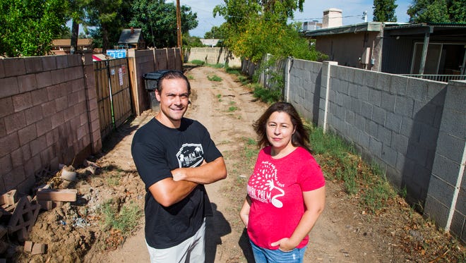 Royal Palm Neighborhood Council President Hillary Rusk and member Luke Bevans requested that the city of Phoenix place gates on an alley in their neighborhood to prevent illegal dumping and other crimes from occurring.