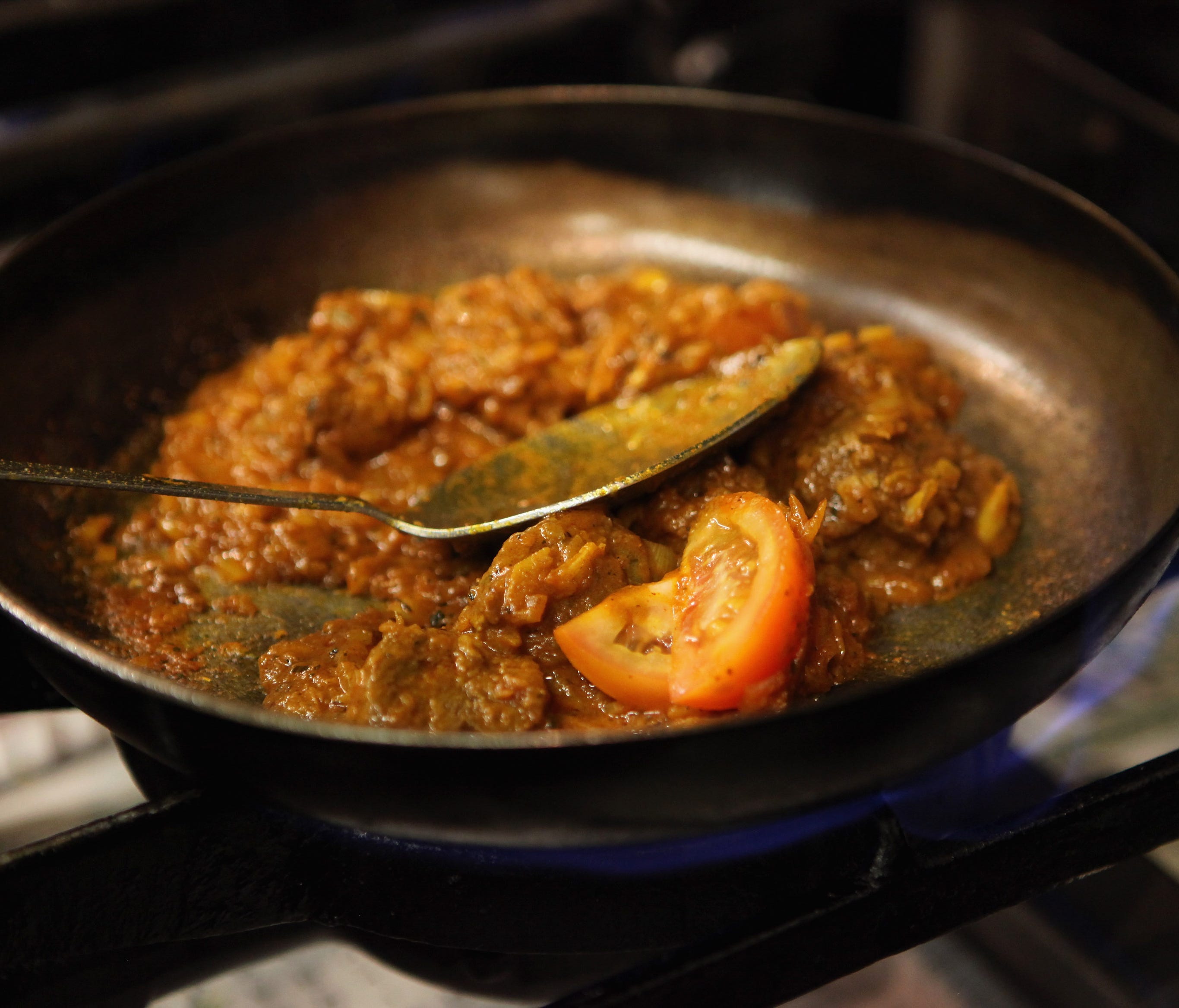 Hot-tempered curry chef threw chili powder at customer who complained.