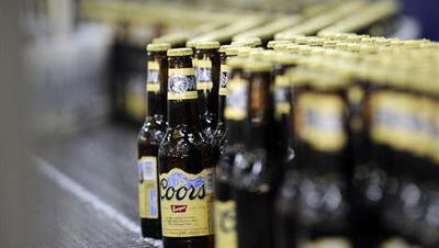 Denver-based Molson Coors Brewing Co. announced Wednesday that it has an agreement with Anheuser-Busch InBev to purchase the 58 percent of the Chicago-based MillerCoors joint.