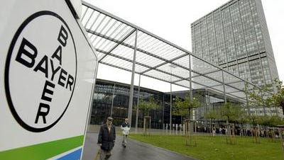 The Bayer headquarters in Germany is shown. The company has proposed buying Monsanto, based in Missouri, the latest in a series of proposed mergers in the segment of the industry.