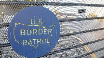 The US Border Patrol sign is seen on a fence at the border area in Nogales city in Santa Cruz County, Arizona, USA, 10 June 2014. Almost 1,118 underage young immigrants coming from Central America are under protection of US Border Patrol. Nogales is for many a symbol of the flaws in the US immigration system. Every day more than 1,000 undocumented migrants are sent to the US part of the city to be deported to Mexico.