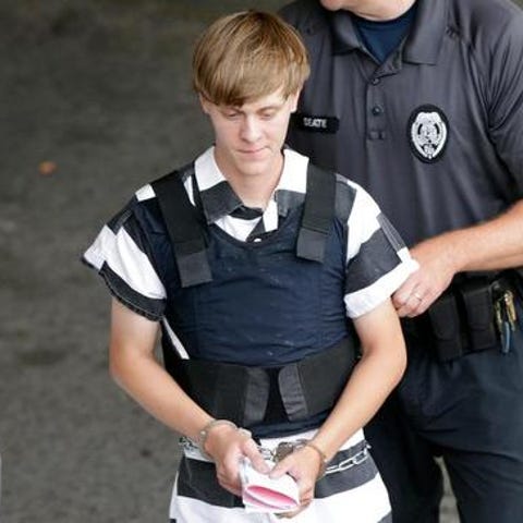 Dylann Storm Roof is escorted from the Cleveland C