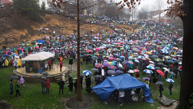 A large group gathers in Falls Park for a Women's March rally in Greenville on Saturday, January 21, 2017.