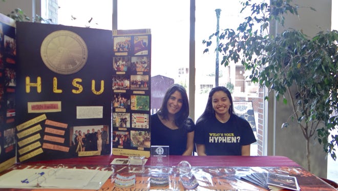 Members from the Hispanic Latin Student Union, Maria Villalobos(left) and Juliee Conde (right) tabled at the BSU film festival on campus.