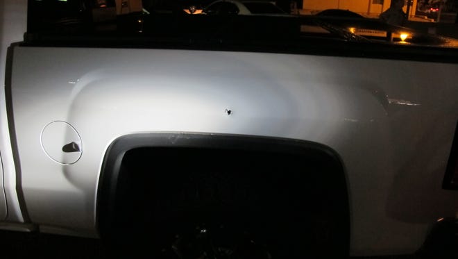 The bullet hole in a white pickup after a shooting on Interstate 10 in Phoenix on Aug. 20, 2016.
