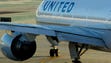 A United Airlines Boeing 777 taxies out for departure