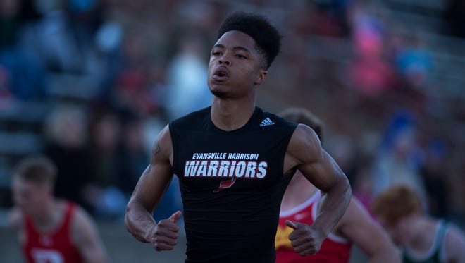 Harrison's Noah McBride finishes the 100 meters in first place at the City track meet. McBride won the state title in the 100 and 200 Friday evening.