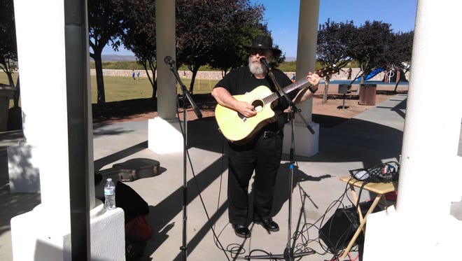 Darrell Elmer Rodgers performs at Bahá’ís of Las Cruces Light of Unity Festival.