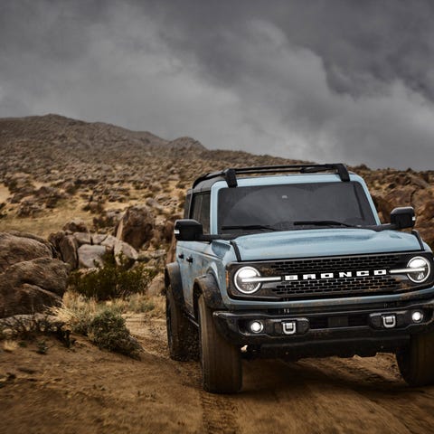 Ford's 2021 Bronco on a dirt road.