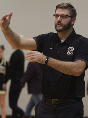 Springfield girls basketball coach Todd Babington gestures during a game against White House Heritage on Tues. Dec. 12, 2017.  Photo by Dave Cardaciotto 