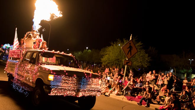 The Mesilla Valley Ascension float illuminates the crowd at the Electric Light Parade on July 3, 2016.