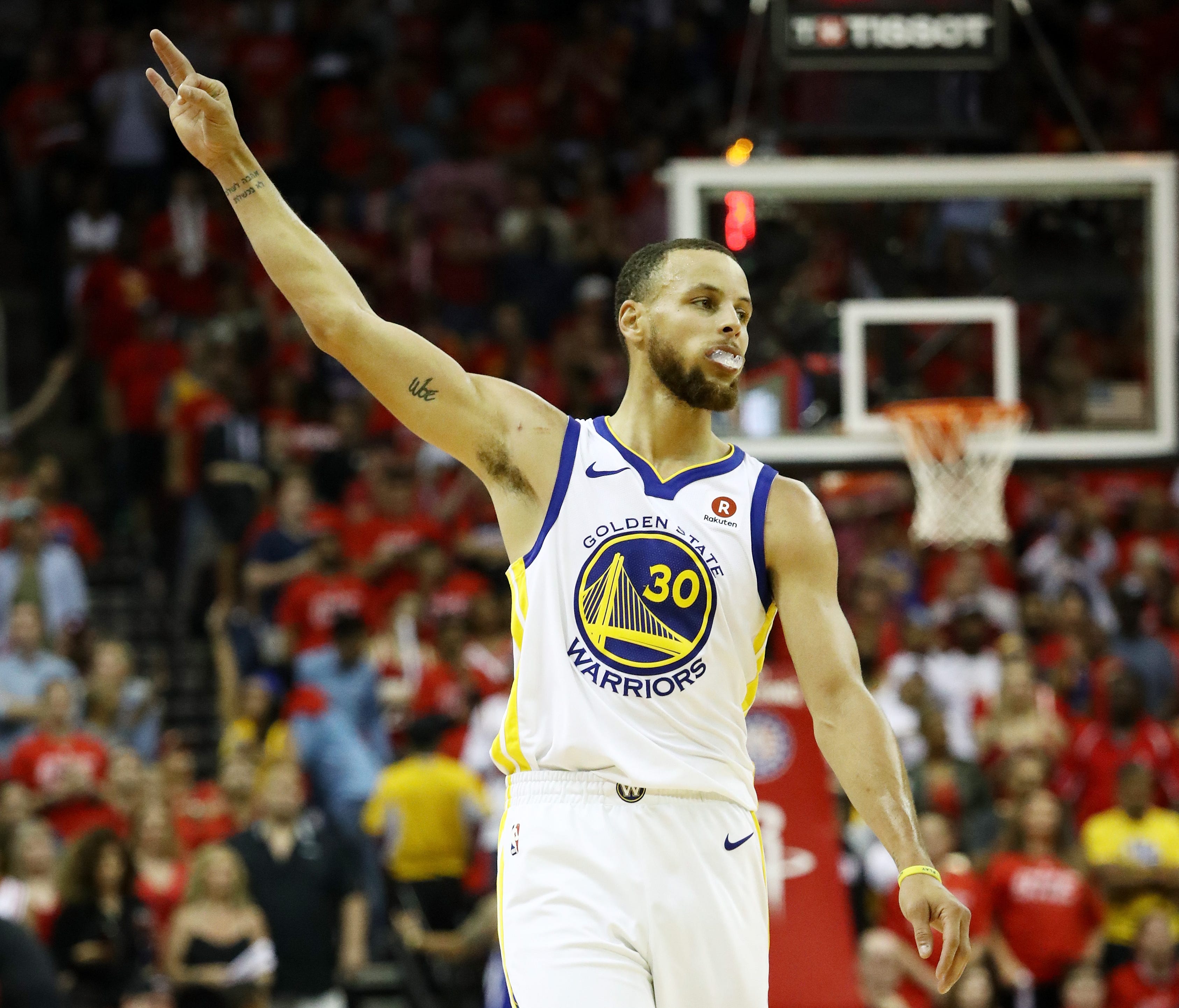 Stephen Curry of the Golden State Warriors celebrates a three-pointer in the third quarter of Game 7.
