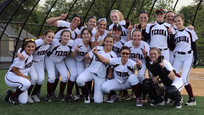 The Verona softball team celebrates clinching the SEC Liberty division crown with a win over Columbia.