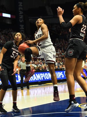 Mar 4, 2018; Nashville, TN, USA; Mississippi State Lady Bulldogs guard Morgan William (2) is fouled by South Carolina Gamecocks guard Tyasha Harris (52) on a drive to the basket during the first half of the SEC Conference Tournament championship game at Bridgestone Arena. Mandatory Credit: Christopher Hanewinckel-USA TODAY Sports