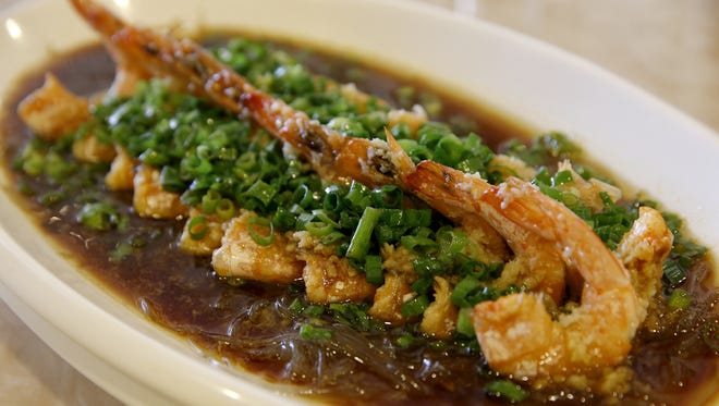 Garlic steamed shrimp over sweet potatoes by 99 restaurant,