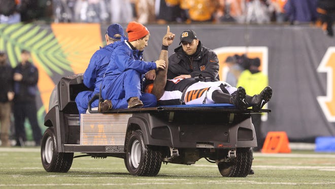 Vontaze Burfict is carted off the field.
