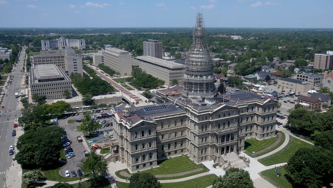 A view of the State Capitol dome as seen from the 21th floor of the Boji Tower in Lansing, Michigan on Wednesday, June 10, 2015.