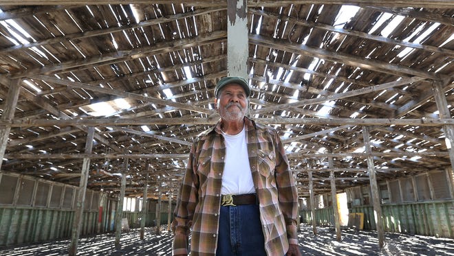 Former Bracero Leopoldo Avila, 93, wore a proud smile as he looked over a decaying building at the Rio Vista Farm in Socorro where he was processed in and out many times. Braceros entering the area were processed through the Rio Vista Farm. Avila said he didn't encounter any prejudice while in the United States but instead praised the county which adopted him. "My grandkids aren't picking cotton," he said during a panel discussion. "They're moving up and up." The event was hosted by the National Trust for Historic Preservation.