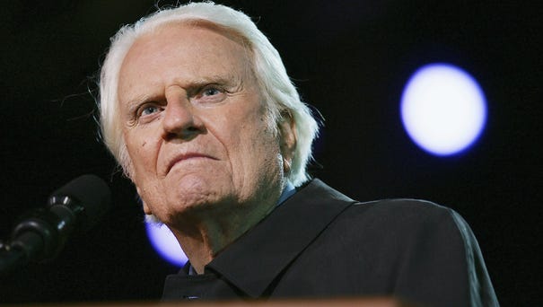 Billy Graham preaches on the third night of the...