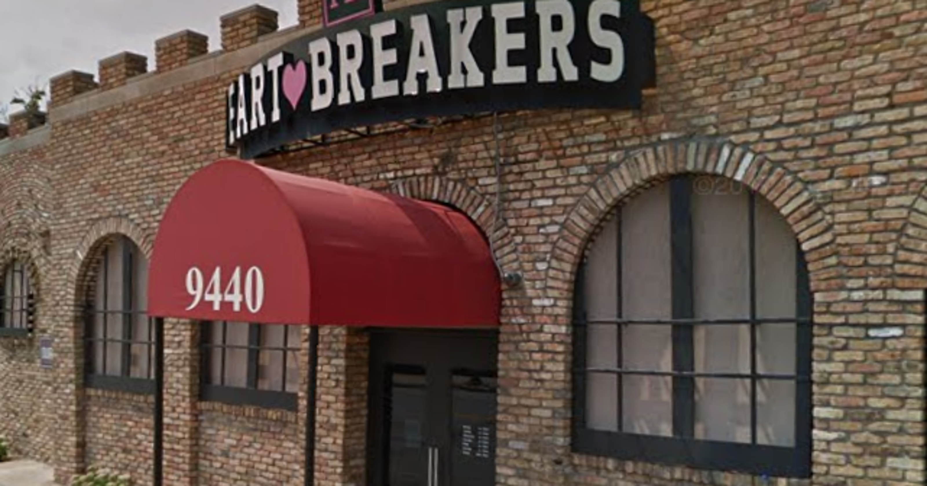 Man throws brick through front door of Heart Breakers strip club