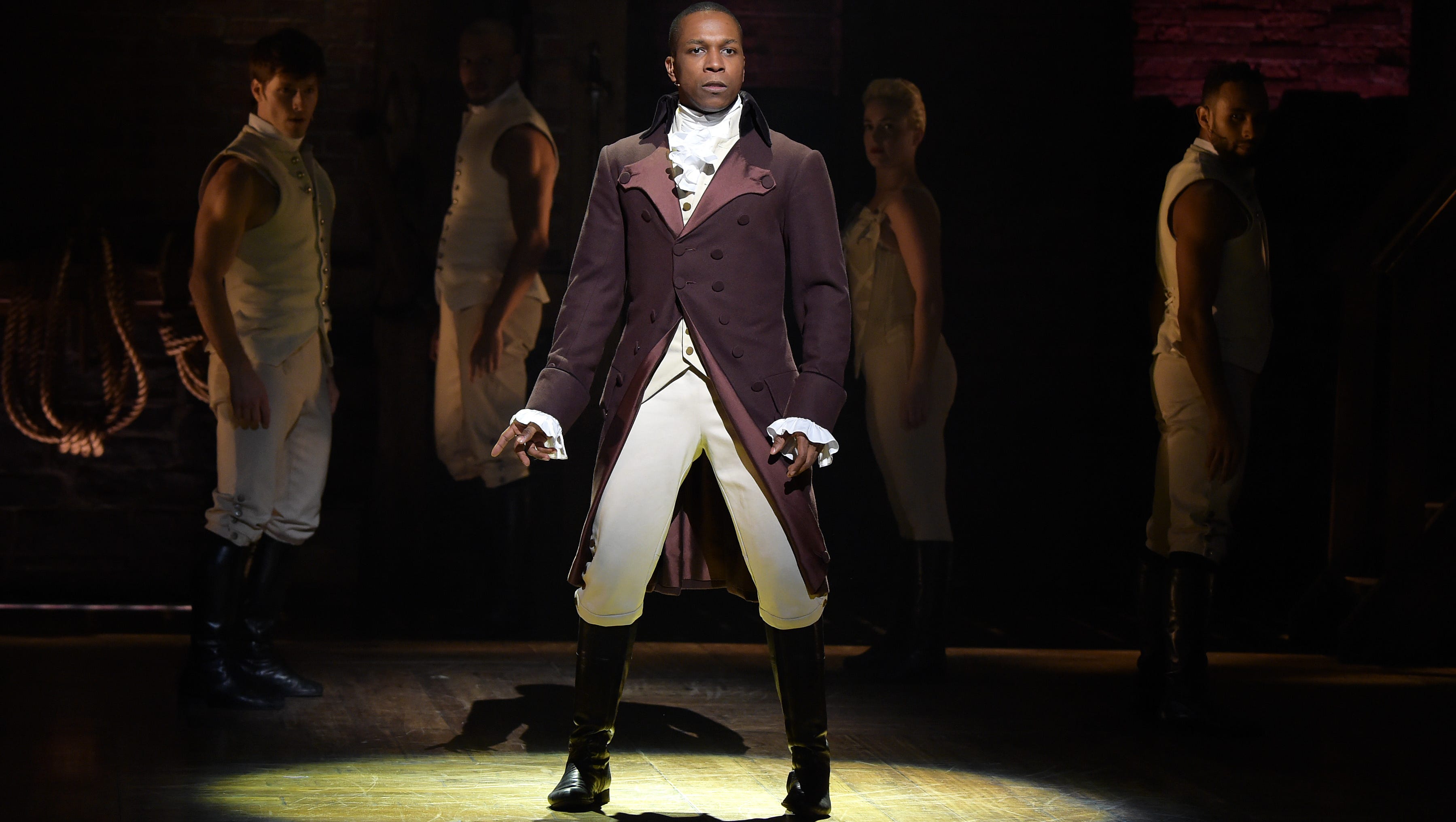 Leslie Odom, Jr. performs on stage as "Hamilton's" Aaron Burr for a Grammy Awards appearance.