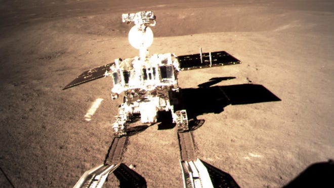 In this photo provided on Thursday, Jan. 3, 2019, by China National Space Administration via Xinhua News Agency, Yutu-2, China's lunar rover, leaves wheel marks after leaving the lander that touched down on the surface of the far side of the moon. A Chinese spacecraft on Thursday, Jan. 3, made the first-ever landing on the far side of the moon, state media said. The lunar explorer Chang'e 4 touched down at 10:26 a.m., China Central Television said in a brief announcement at the top of its noon news broadcast.