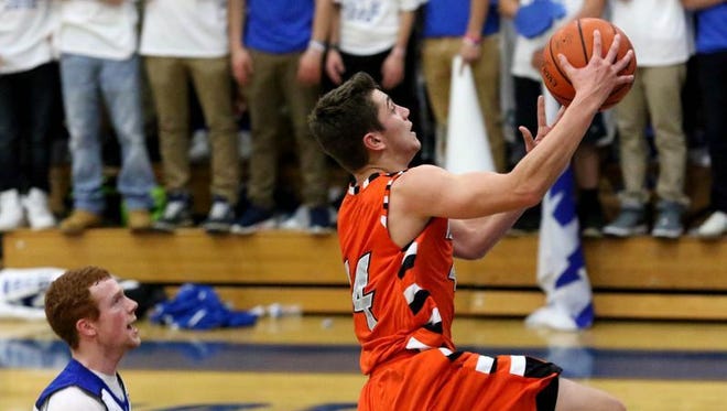 Somerville's Joe Mosca goes up for a lay up during the second quarter against Warren Hills on Tuesday.
