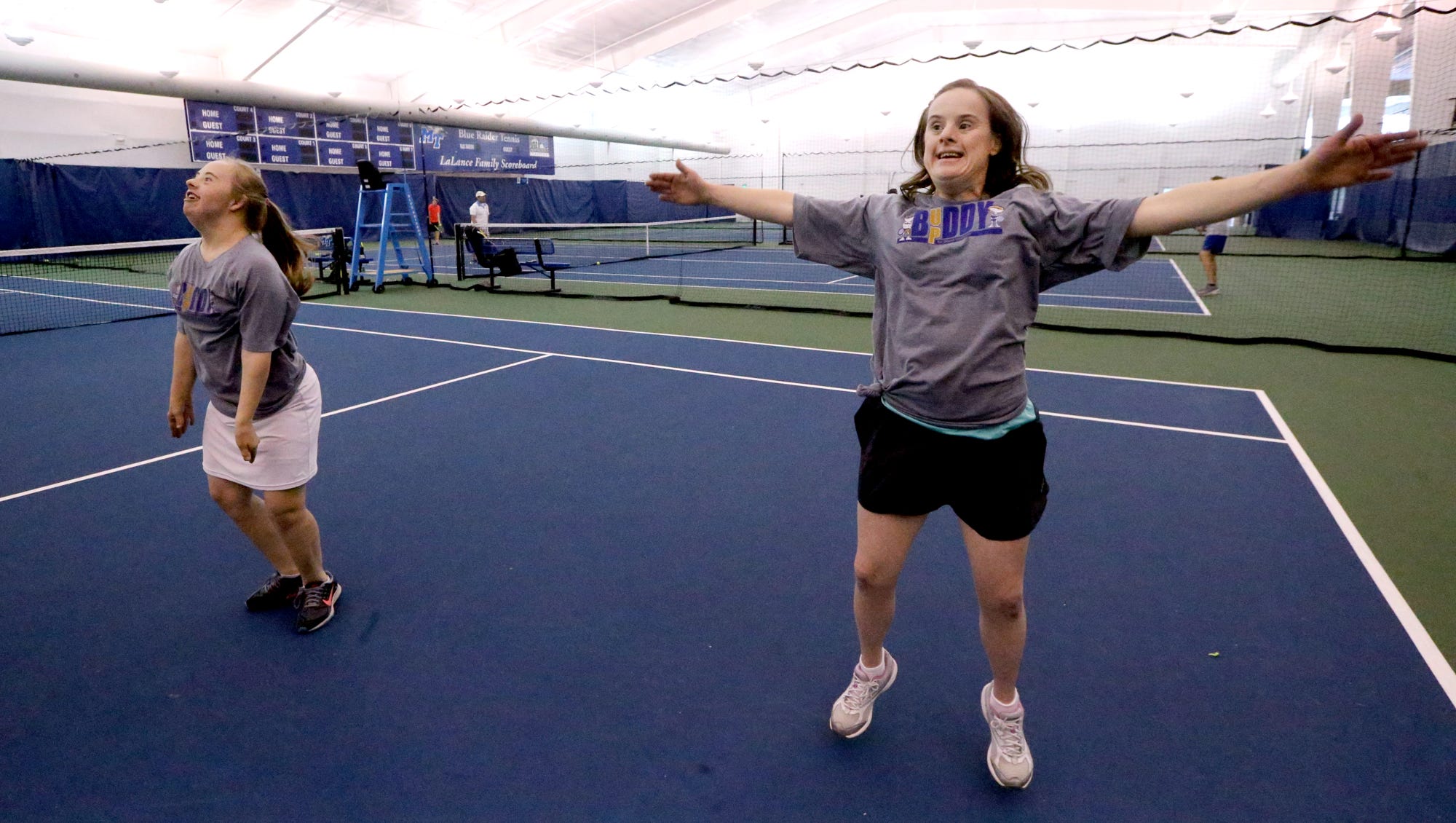 Players With Special Needs Volunteers Build Bond Through Tennis
