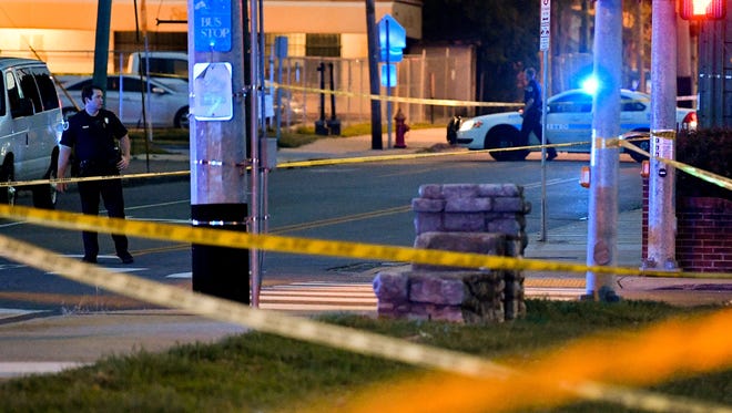 Metro Nashville Police officers work the scene of a shooting near Jo Johnston and 17th Avenue North Thursday, July 26, 2018, in Nashville, Tenn.