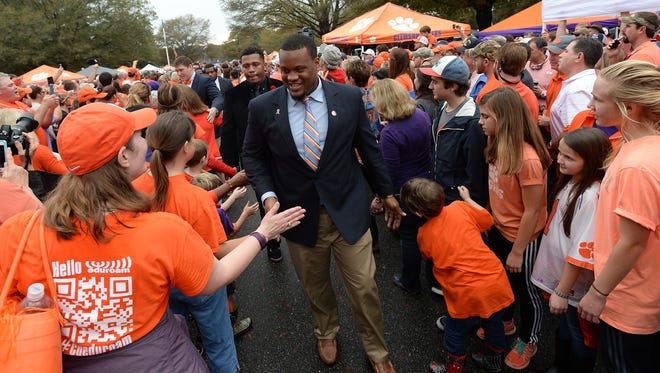 Clemson players and fans take part in Tiger Walk before the Tigers game against Florida State Saturday at Clemson's Memorial Stadium.
