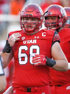 J.J. Dielman (68) of the Utah Utes prepares to run  play during the first half of their game against the Brigham Young Cougars at Rice Eccles Stadium on September 10, 2016 in Salt Lake City, Utah.