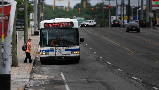 Commuters use the MTA bus system along Nolensville Road Wednesday, May 24, 2017, in Nashville, Tenn.