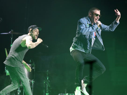 Hip-hop duo Macklemore (R) & Ryan Lewis perform at