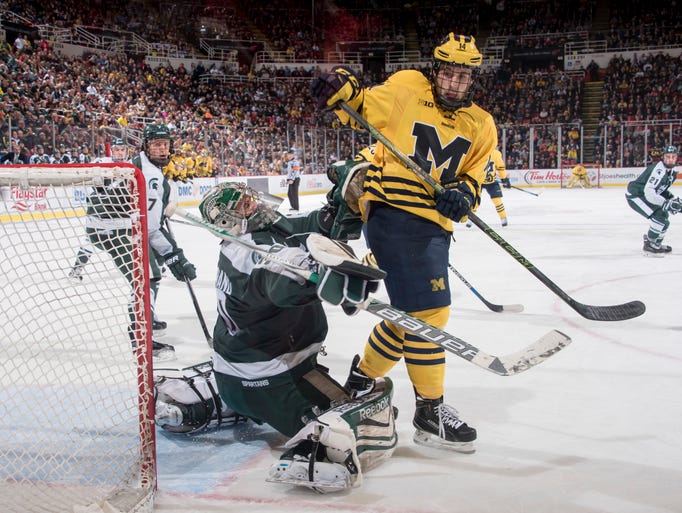 Michigan forward Tyler Motte joins teammates JT Compher