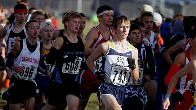 Cross country runners compete in the Division 3 final at Michigan International Speedway on Nov. 3, 2012.