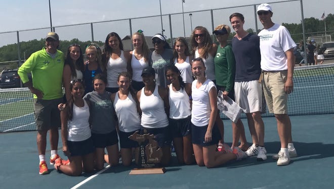 Ann Arbor Greenhills' girls tennis team celebrates winning the Division 4 state tennis championship on June 3, 2017 in Holly.