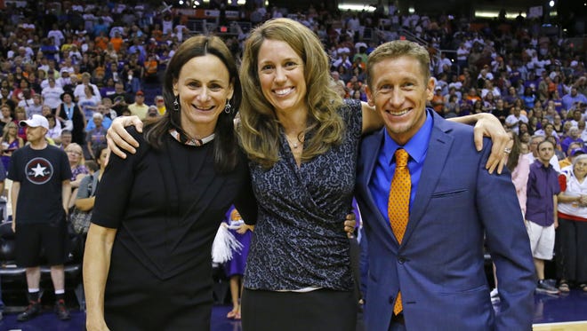 Phoenix Mercury Head Coach Sandy Brondello, and assistants Julie Hairgrove  and Todd Troxel following their win against the Chicago Sky in Game 2 of the WNBA Finals Tuesday, Sept. 98  2014 in Phoenix, Ariz The Mercury won 97-68.