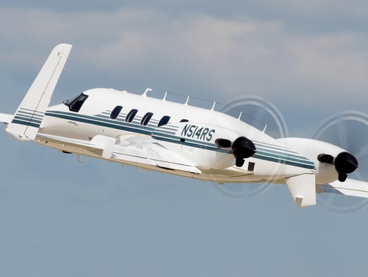 An intensely singular Beech Starship takes off for a flight
