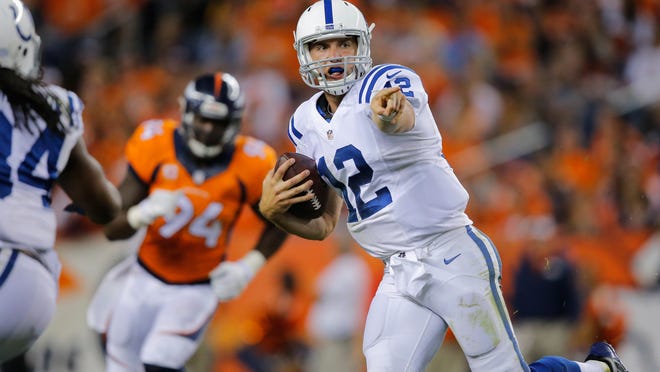 
Colts quarterback Andrew Luck scrambles against the Broncos on Sept. 7 in Denver. 
