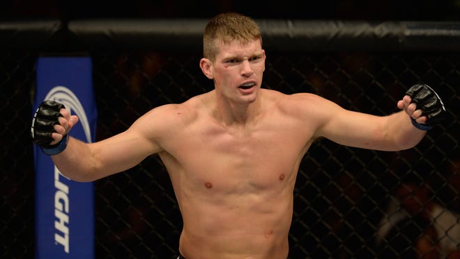 Getty Images
Stephen Thompson reacts to his victory over Jake Ellenberger in their welterweight bout during the Ultimate Fighter Finale inside MGM Grand Garden Arena this month in Las Vegas.
LAS VEGAS, NV - JULY 12:  Stephen Thompson reacts to his victory over Jake Ellenberger in their welterweight bout during the Ultimate Fighter Finale inside MGM Grand Garden Arena on July 12, 2015 in Las Vegas, Nevada.  (Photo by Brandon Magnus/Zuffa LLC/Zuffa LLC via Getty Images)