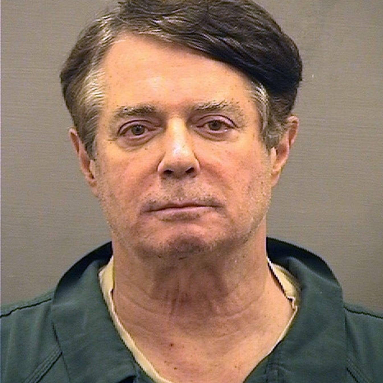 Paul Manafort poses for a mugshot photo at the Alexandria Detention Center in Alexandria, Virgina.