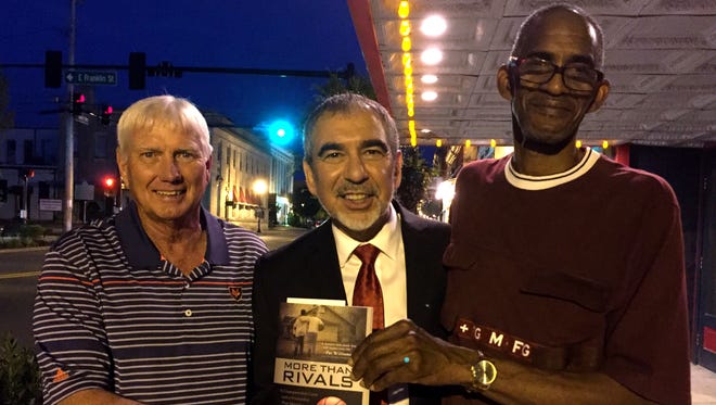 From left: Eddie Sherlin, author Ken Abraham and Bill Ligon were all on hand for Tuesday’s signing and launch party for “More Than Rivals,” a book profiling the 1970 contest between then all-black Union High and all-white Gallatin prior to the schools’ integration later that fall.