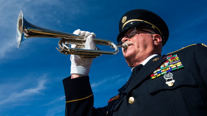 Bugler plays solemn notes of soldiers' final farewells