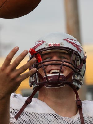 An all-smiling Tyler Evans captured during his playing days at Strafford High School.